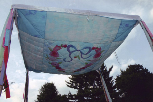 A chuppah is a canopy under which a Jewish wedding takes 